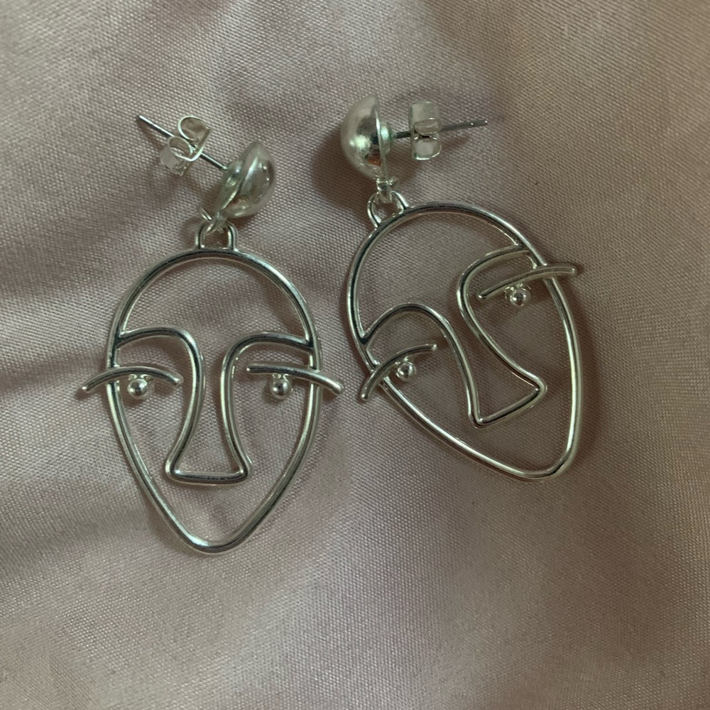 silver abstract face earrings